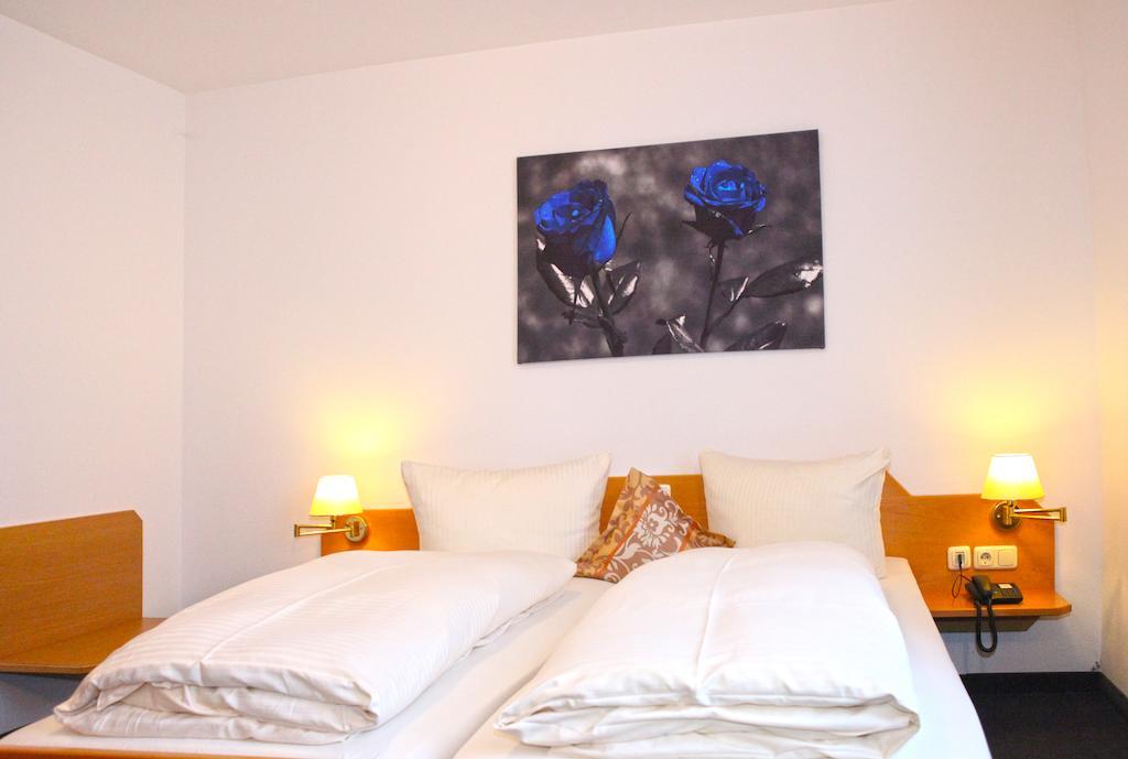 Hotel Am Ostpark Neubiberg Rum bild